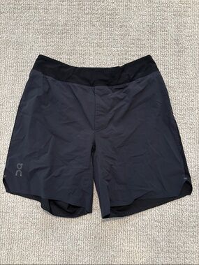 Men’s ON running shorts. (Size Medium)
